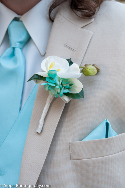 Groom orchid boutonniere